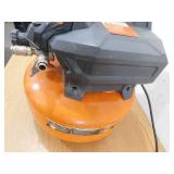 RIDGID 6 Gal. 150 PSI Portable Electric Oil-Free Jobsite Pancake Air Compressor with Dual Pressure Gauges and 2-Quick Couplers