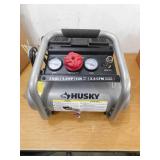 Husky 2 Gal. 135 PSI Portable Electric Oil-Free Quiet Jobsite Air Compressor with Dual Pressure Gauges and 1-Quick Coupler