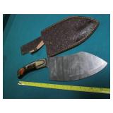 Hand crafted knife with a leather s...
