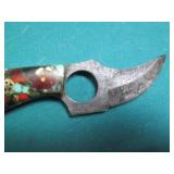 Hand crafted knife with a leather s...