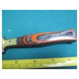 Hand crafted knife with a leather s...