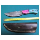 Hand crafted knife with a leather s...