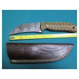 Hand crafted knife with a leather s...