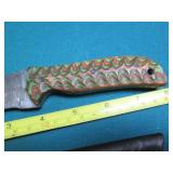 Hand crafted knife with a leather s...