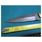 Hand crafted knife with a leather s...