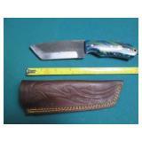 Hand crafted knife with a leather s...