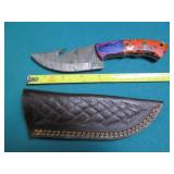 Hand crafted knife with a leather s...