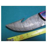 Hand crafted knife with a leather s...