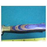 Hand crafted knife with a leather s...