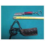 Small Hand crafted knife with a lea...
