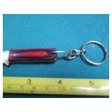 Small Hand crafted knife with a lea...