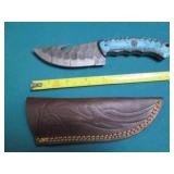 Hand crafted knife with a leather s...