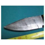 Hand crafted knife with a leather s...