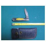 Hand crafted pocket knife with a le...