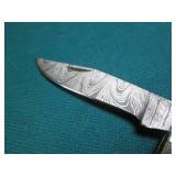 Hand crafted pocket knife with a le...