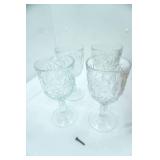 Libbey Hobstar clear pressed glass water goblet with starburst pattern, set of 4