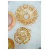 Vintage depression glass including translucent divided dish, serving platter, Fenton Marigold Carnival glass and more.