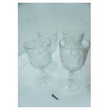 Libbey Hobstar clear pressed glass water goblet with starburst pattern, set of 4
