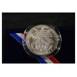 United States Mint 1995 Special Olympics World Games Silver Dollar COA in Blue Box