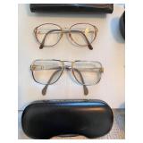 Collection of 7 Vintage and Designer Eyeglasses with Cases and extra cases