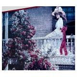 Framed Artwork of Woman on Porch with Red Bow, 33x29 in