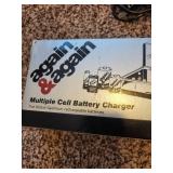 Gould Again & Again Multiple Cell Battery Charger with 4 D-Size Batteries