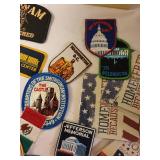 Collection of Vintage Travel Patches, Keychains, Vietnam Memorabilia, and Souvenir Ship Model