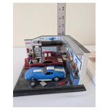 Danbury Mint "The Speed Shop" Diorama with Cadillac Allante Story Tape Sets