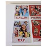 8 Piece Coca-Cola 1950s Calendar Girl Reproduction Tin Sign Set