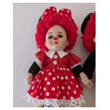 Pair of Porcelain Clown Dolls with Red Yarn Hair and Stands