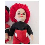 Pair of Porcelain Clown Dolls with Red Yarn Hair and Stands