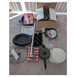 Kitchenware Collection with Pots, Roasting Pans, Mugs, and Cookbooks