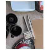 Kitchenware Collection with Pots, Roasting Pans, Mugs, and Cookbooks