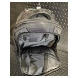 Black Rolling Backpack with Telescoping Handle, Dual Wheels, and Multi-Compartment Organizer