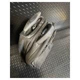 Black Rolling Backpack with Telescoping Handle, Dual Wheels, and Multi-Compartment Organizer