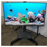 65" Samsung QB65R HDR 4K UHD (Ultra-High Def) Commercial Smart LED Display on Ergotron Neo-Flex Heavy-Duty Rolling TV Cart with Adjustable Shelf and Rotating TV Mount