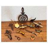 Eclectic Vintage Collectibles Lot with Toy Planes, Trivet, and Decorative Items