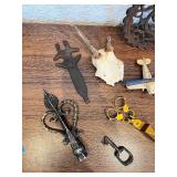 Eclectic Vintage Collectibles Lot with Toy Planes, Trivet, and Decorative Items