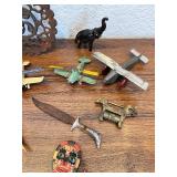 Eclectic Vintage Collectibles Lot with Toy Planes, Trivet, and Decorative Items