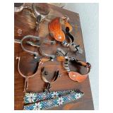 Collection of Western Spurs with Tooled Leather and Beaded Strap