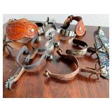 Collection of Western Spurs with Tooled Leather and Beaded Strap