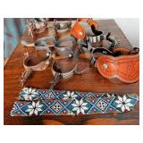 Collection of Western Spurs with Tooled Leather and Beaded Strap