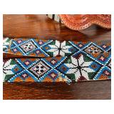 Collection of Western Spurs with Tooled Leather and Beaded Strap