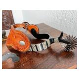 Collection of Western Spurs with Tooled Leather and Beaded Strap