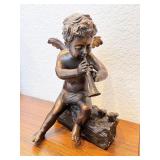 Bronze Cherub Figurine Playing Flute on Log with Birds