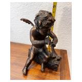 Bronze Cherub Figurine Playing Flute on Log with Birds