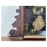 Antique Wooden Mantel Clock with Ornate Carving and Glass Door