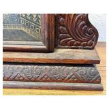 Antique Wooden Case Mantel Clock with Ornate Carving and Glass Panel