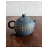 Yixing Clay Teapot with Chinese Script Decoration