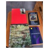 Collection of 4 Art and Graphic Novels Including Claude Monet, Goya, and Marvel 1602